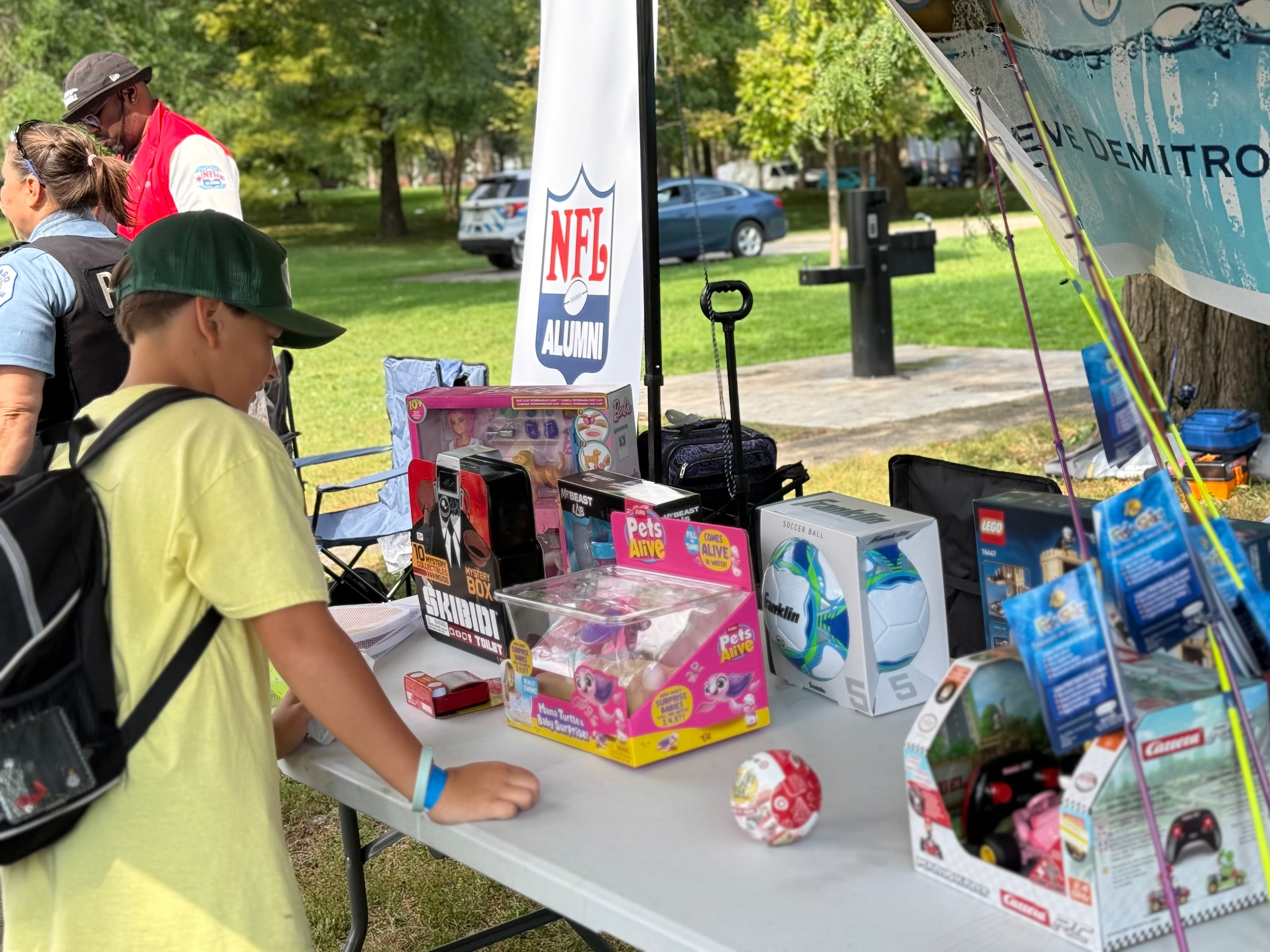 Prize table loaded with toys and games at the fishing derby